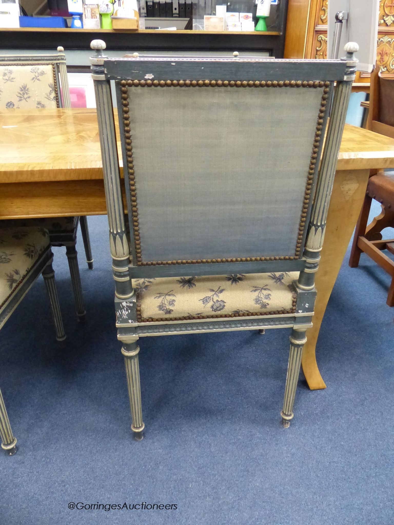 Five French painted dining chairs, with upholstered seats and backs.